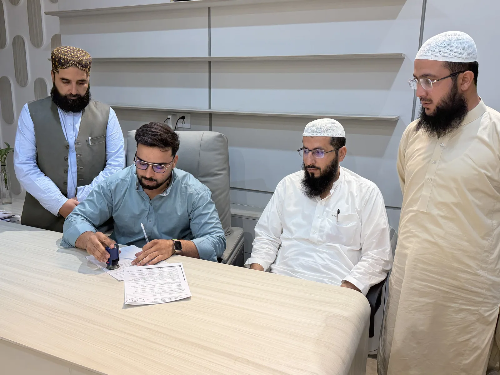 Mobilistan CEO Samiullah signing the Sharia advisory agreement with Al Hijrah in Quetta